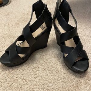 Brand new CM size 6 black shoe